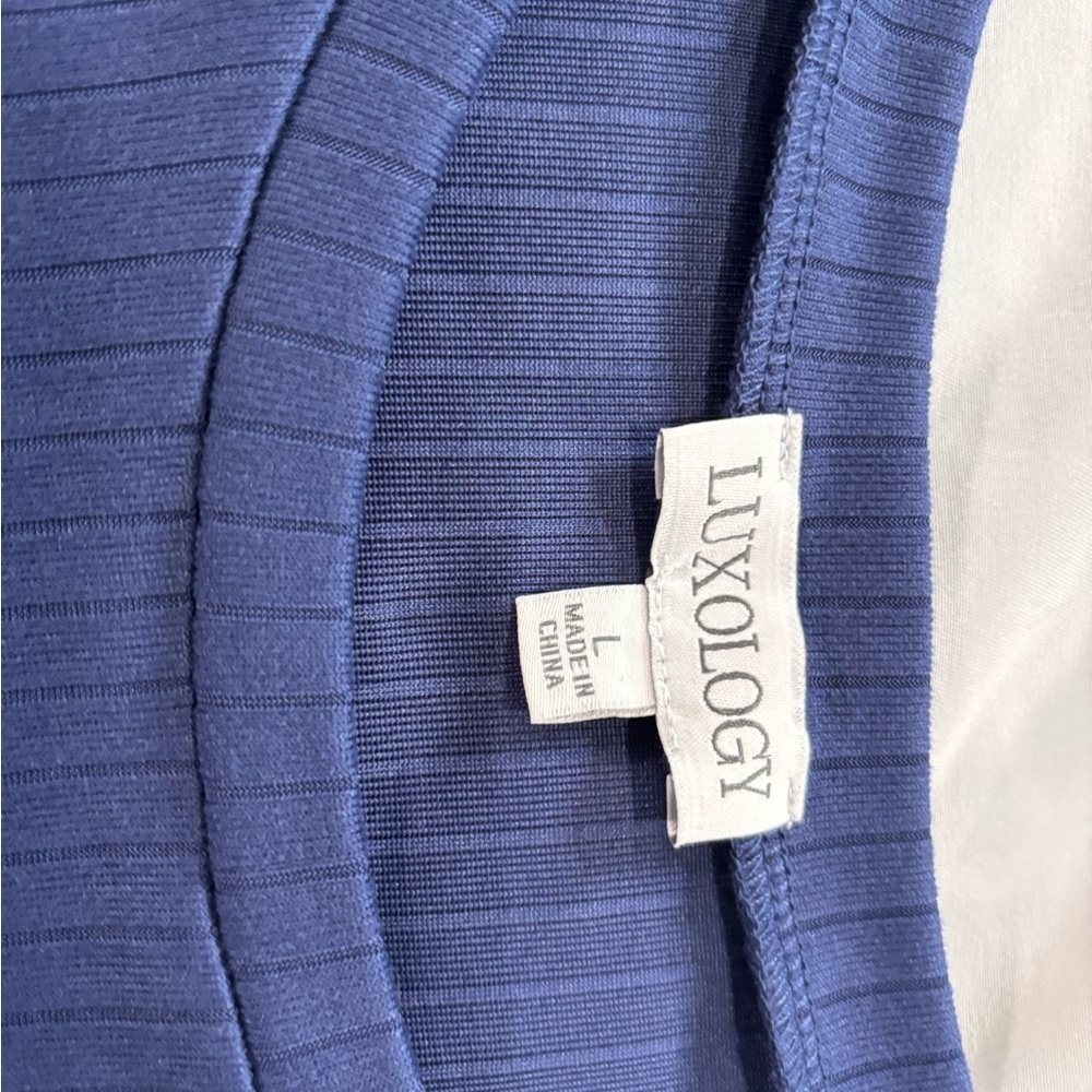 Casual Flair Sleeve Blouse, Short Sleeve Crew Neck Solid Blouse.
Lot I - Picture 4 of 5